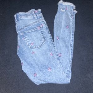 butterfly embroidered ripped jeans